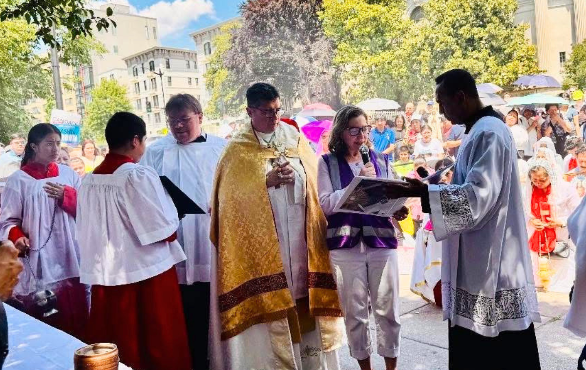 <div><p>St. Camillus Parish in Silver Spring, Maryland, created a special altar featuring photos, names and prayer intentions of those who are detained or too afraid to attend the Archdiocese of Washington’s Corpus Christi procession. Photos courtesy of Sister Eilis McCulloh, Kathy Gallagher and Edwin Mendez.</p></div>