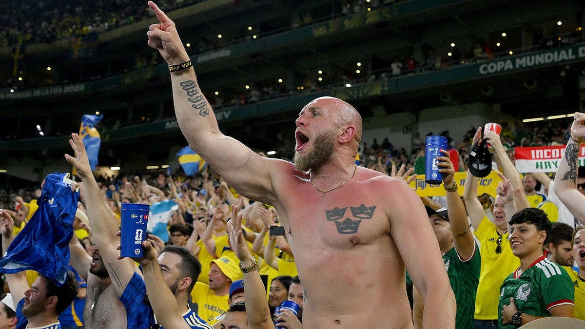 Fans of Sweden celebrating at Monterrey Stadium in Guadalupe, Mexico.