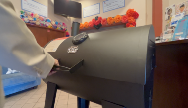 Reporter Jeydah Jenkins judges Dynamite Dads BBQ cookoff