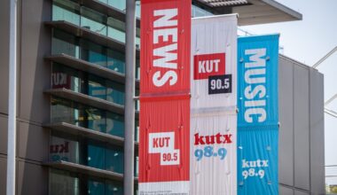 What is KUT's relationship with UT Austin?