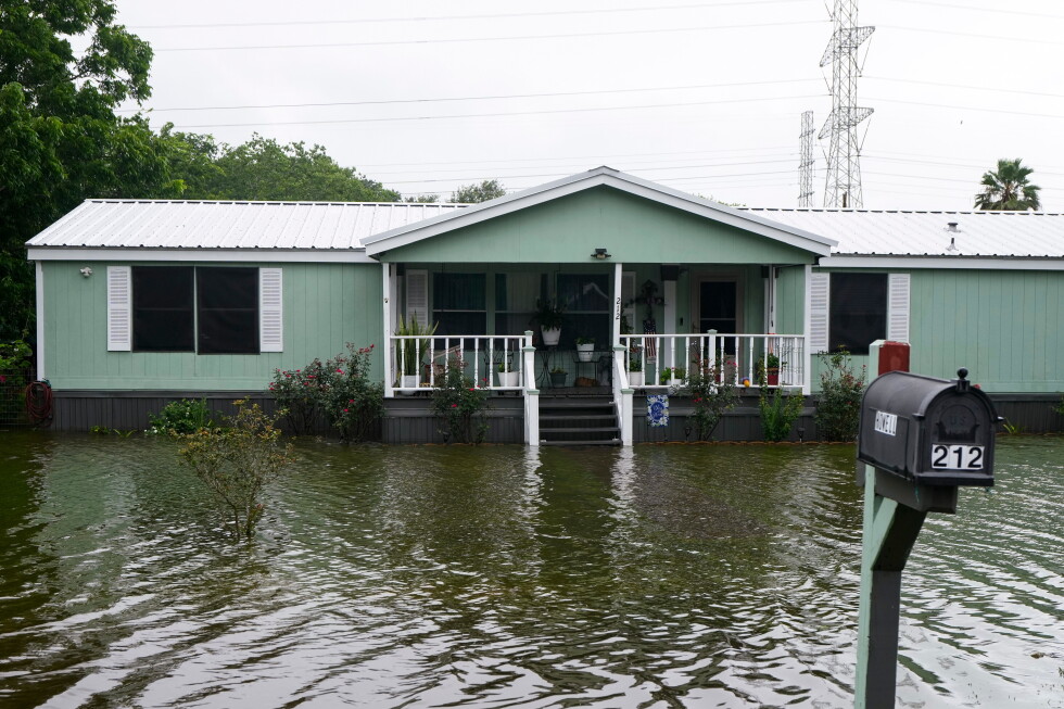 Tropical Cyclone Arthur degenerates to a low pressure area along the upper Texas coast