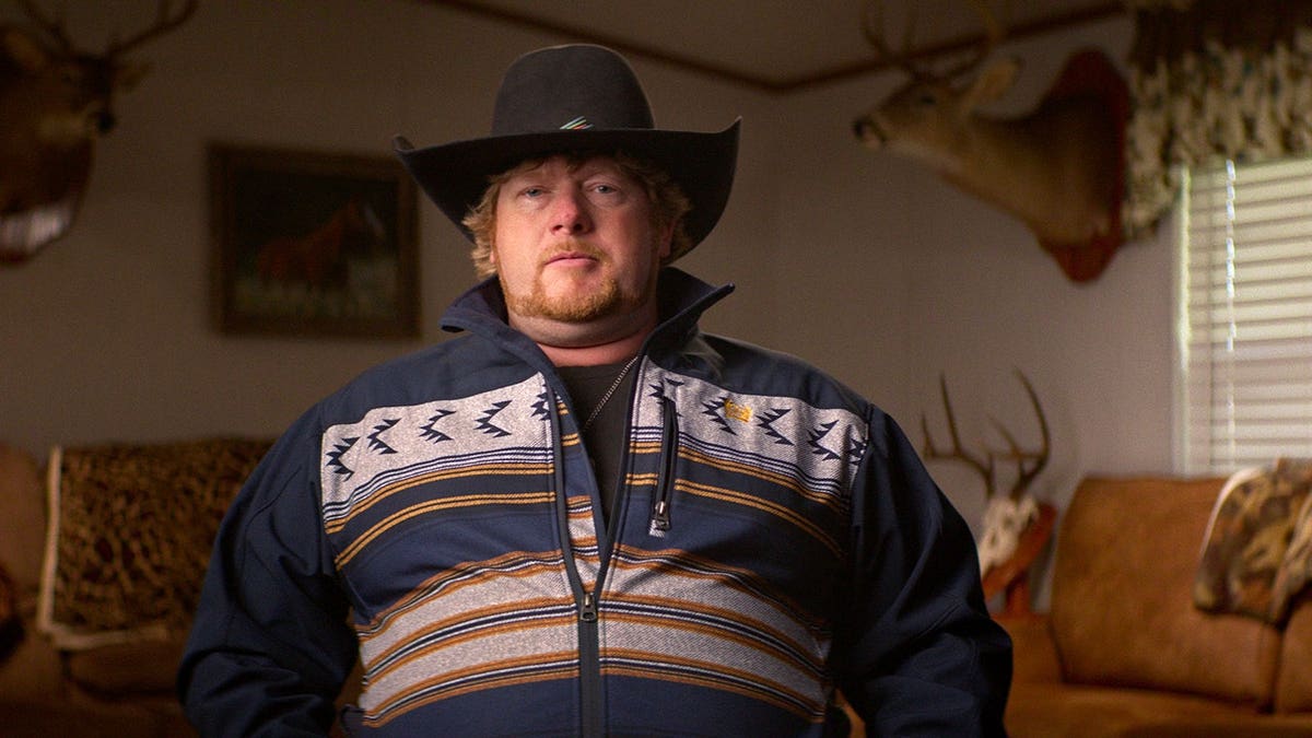 Wade Griffin standing in a scene from Maternal Instinct.