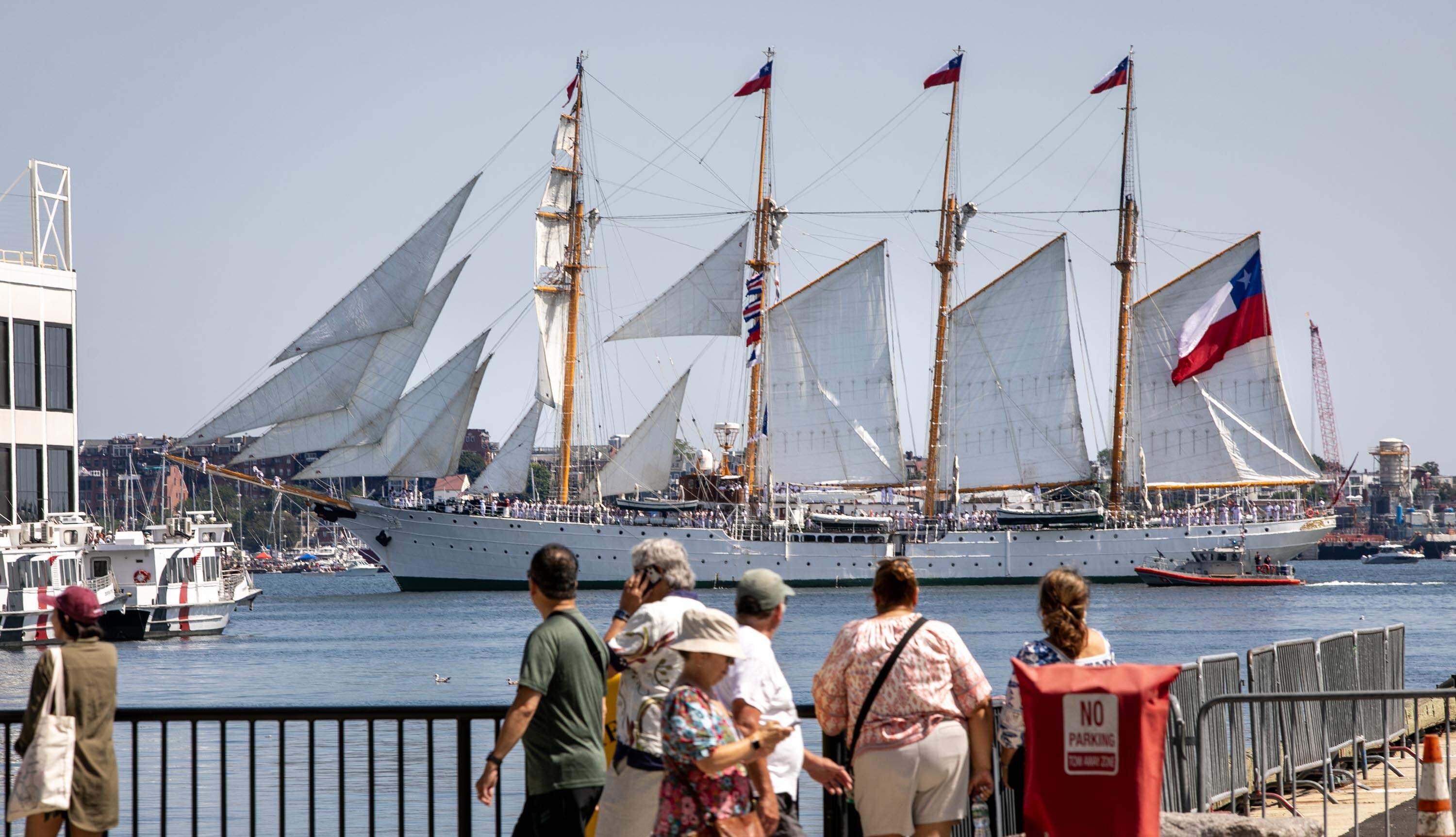The Chilean barquentine Esmeralda enters Boston Harbor during Sail Boston 2026. (Robin Lubbock/WBUR)