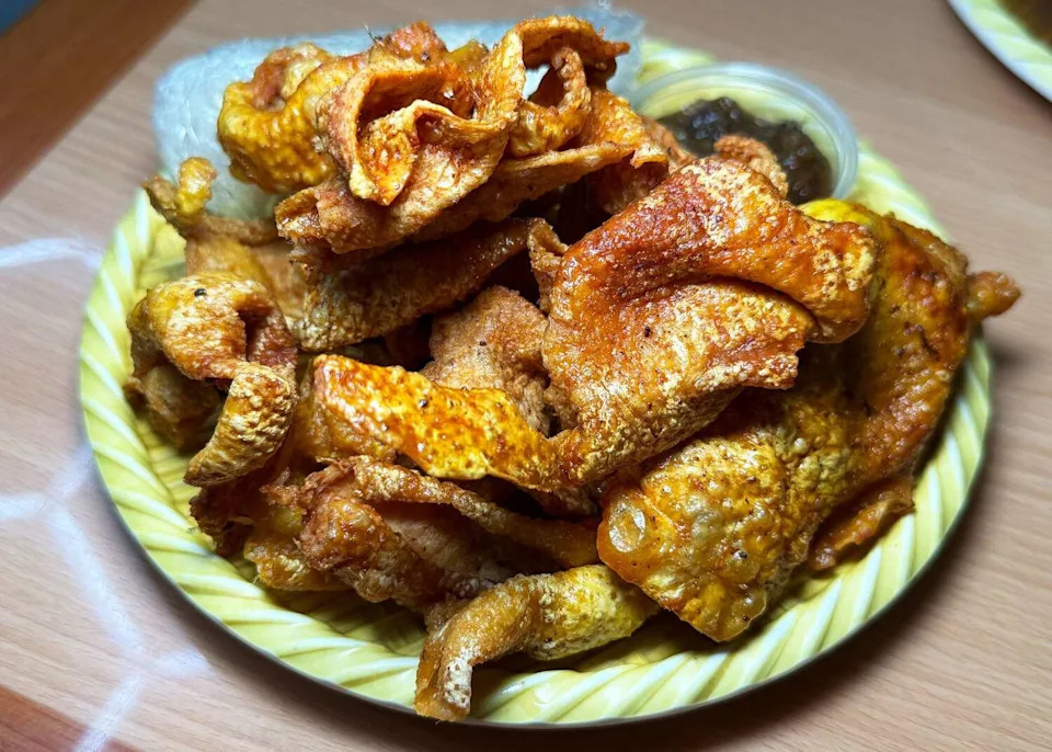Crispy chicken skin at Banh Somtum. (Bao Ong / Houston Chronicle)