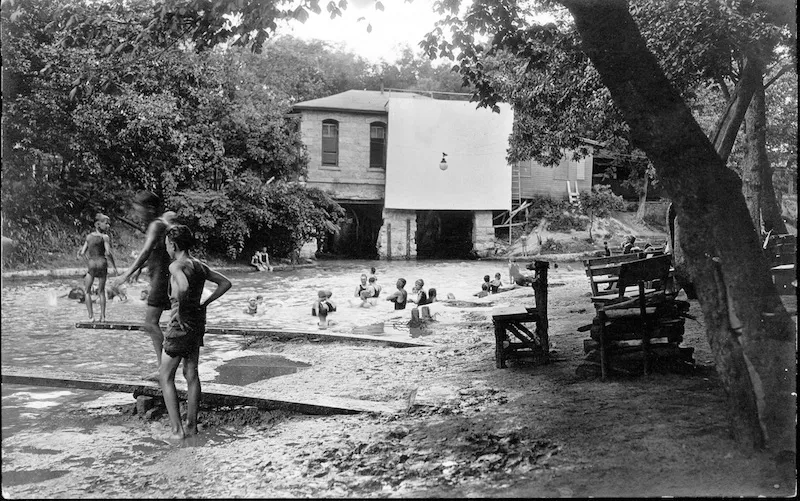 Outdoor movies in San Antonio date at least back to the 1920's. On Lambert Beach in Brackenridge Park, a movie screen was attached to the old pump house. Photo from the University of Texas at San Antonio Libraries Special Collections.