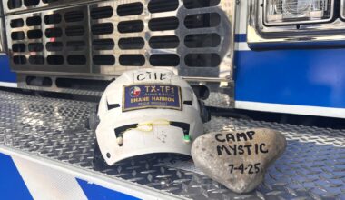 Fort Worth firefighter Shane Harmon, whose helmet is on the left, is one of five North Texas first responders who spoke to The Dallas Morning News about their Hill Country flood experiences.
