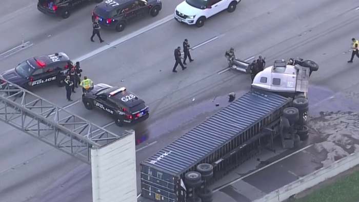 Fiery Katy Freeway crash kills 2 after 18-wheeler rolls onto car