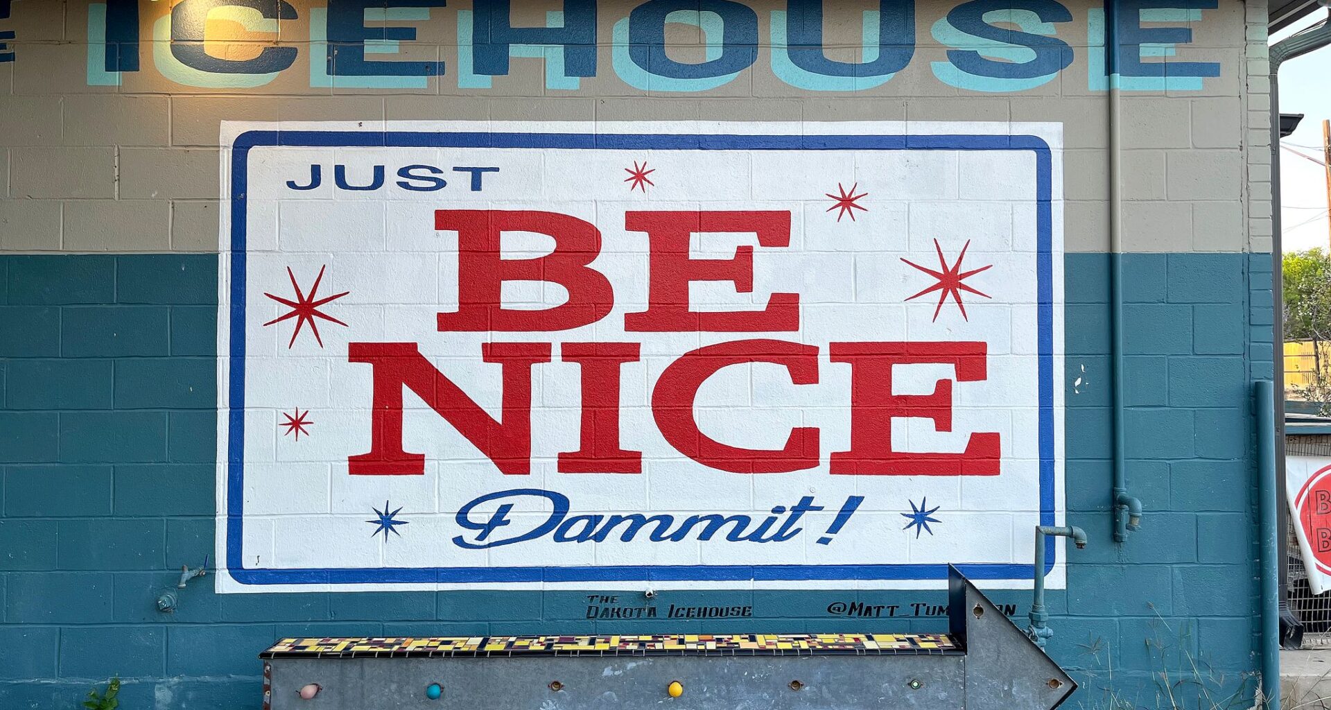 The Dakota East Side Ice House's motto is "Just be Nice, Dammit!?"