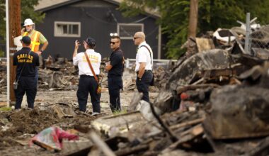 Investigators from Dallas Fire-Rescue inspect the leveled The Clyde apartments on East 9th St near Patton Avenue in the Oak Cliff area of Dallas, May 30, 2026. The apartment building exploded and burst into flames, Thursday.