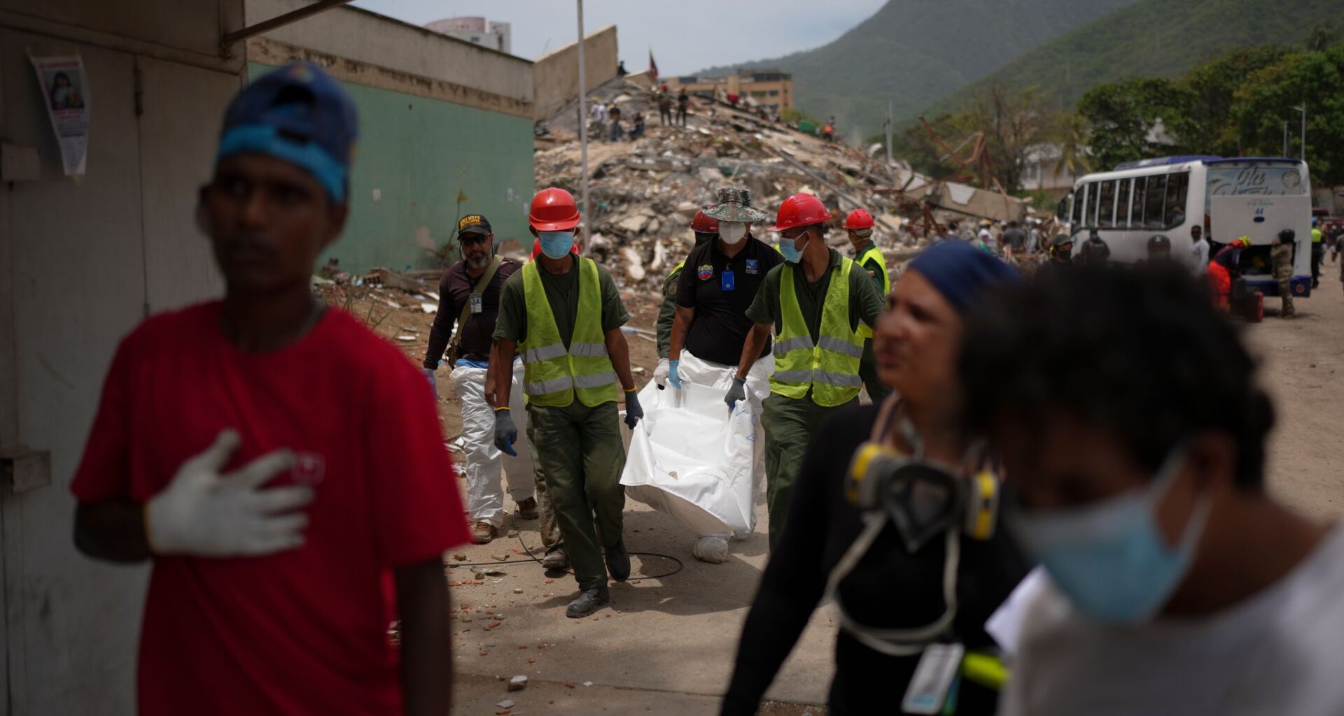 Venezuelans are rushing to identify the bodies of their loved ones as earthquake deaths multiply
