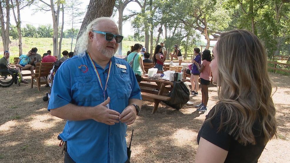 Brandon Briery talks about camp inspections along Camp CAMP's riverfront area