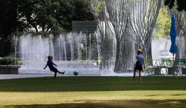 Children play soccer in Dallas' Klyde Warren Park. Isolated to scattered storms could bring a brief chance of rain to parts of Dallas-Fort Worth late Sunday afternoon.