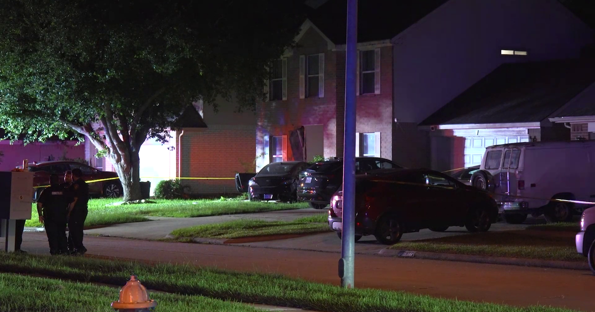 Driver found with multiple gunshot wounds after crashing into Harris Co. home