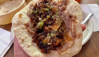 Barbacoa guisada taco with beans and salsa from Mittman Fine Foods. 