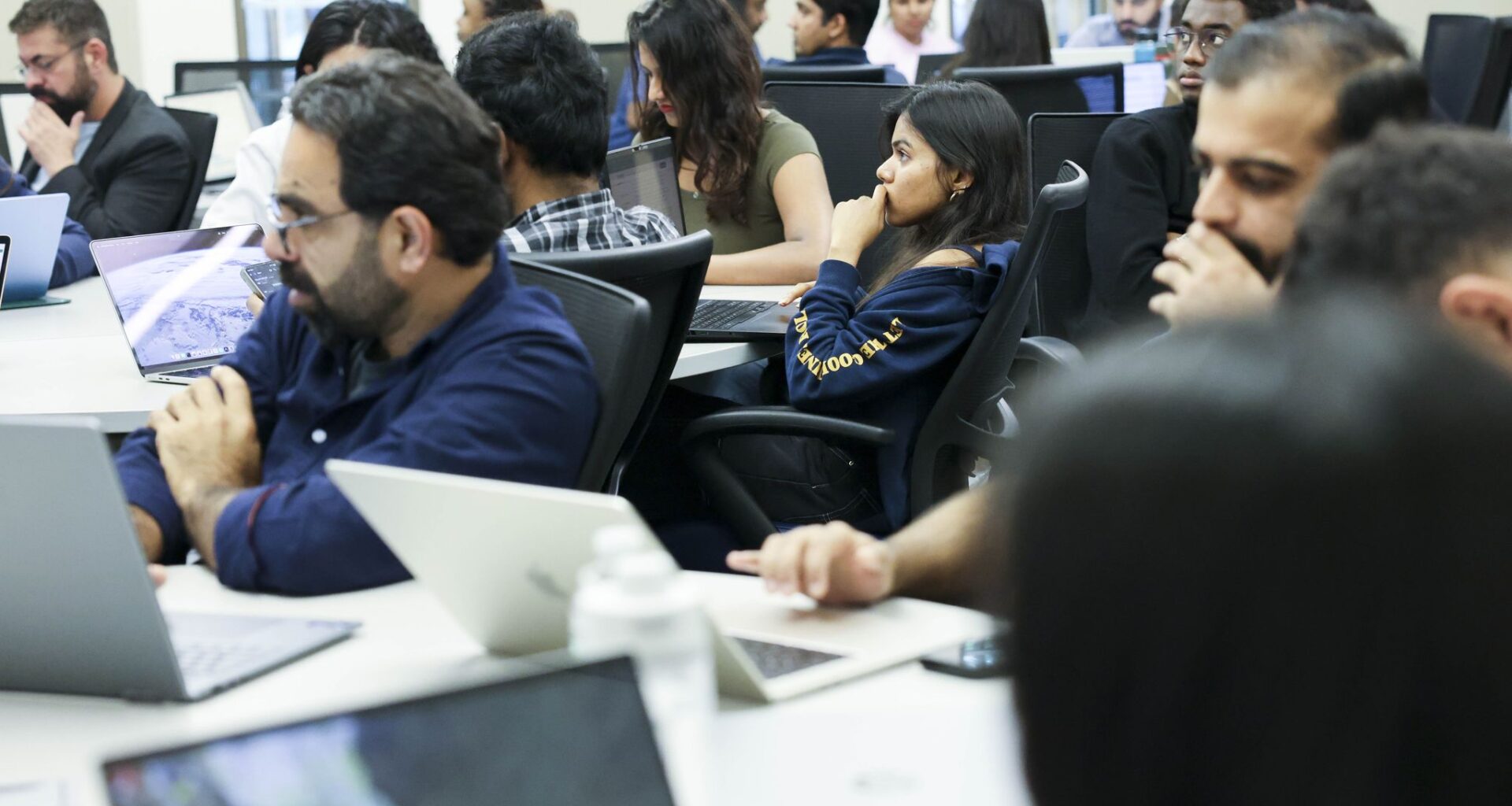 Students observe during the final presentation  of their project during a class on artificial intelligence at University of Texas at Dallas on Wednesday, May 6, 2026.