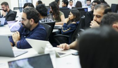 Students observe during the final presentation  of their project during a class on artificial intelligence at University of Texas at Dallas on Wednesday, May 6, 2026.