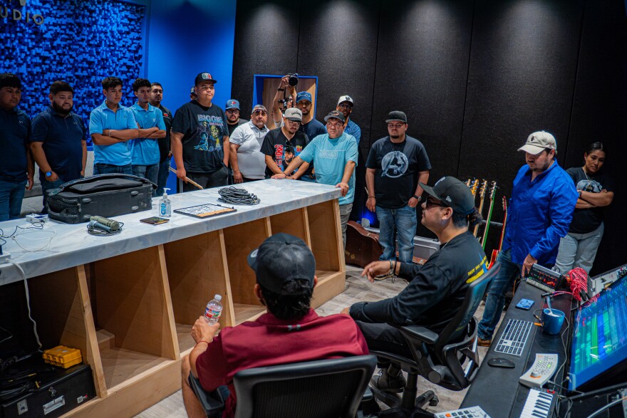 Gama Diaz, DFW Music Studio producer and professional drummer, talks to students about taking risks with music during Baqueteros Macizos Conjunto and Norteño drum camp June 2-3 in Midlothian.