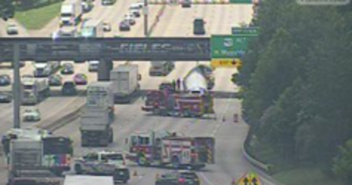 Traffic backup after 18-wheeler hits East Freeway bridge
