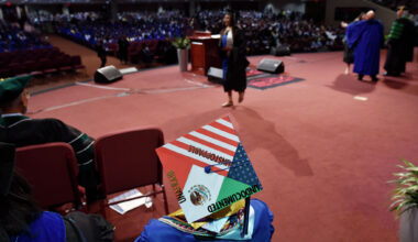 A graduate wears a decorated graduation cap as diplomas are awarded by the University of North Texas at Dallas on May 17, 2019. His cap reads, "unafraid, undocumented, unstoppable." 
