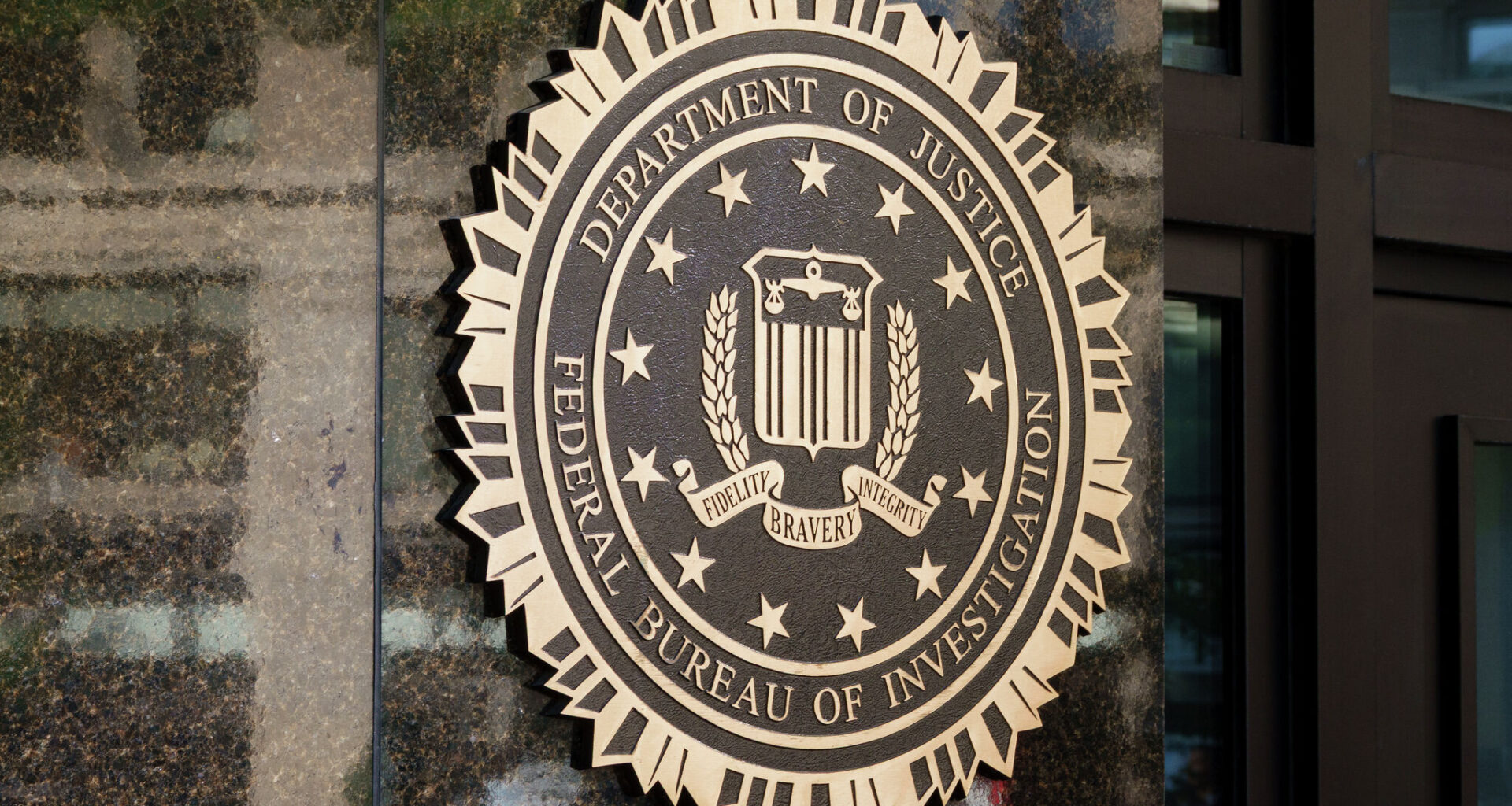 WASHINGTON, DC - MAY 6: The Department of Justice logo is displayed before U.S. Attorney General Pam Bondi arrives for a news conference at the Department of Justice on May 6, 2025 in Washington, DC. The Justice Department along with the Drug Enforcement Administration (DEA) and the U.S. Attorney's Office for the District of New Mexico are set to announce that they have completed an operation targeting a large drug trafficking organization that has been dealing fentanyl and other illicit narcotics. (Photo by Andrew Harnik/Getty Images)