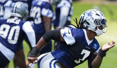 Dallas Cowboys defensive coordinator Christian Parker visits with Dallas Cowboys linebacker Shemar James during a mini-camp practice at The Star in Frisco, June 16, 2026.