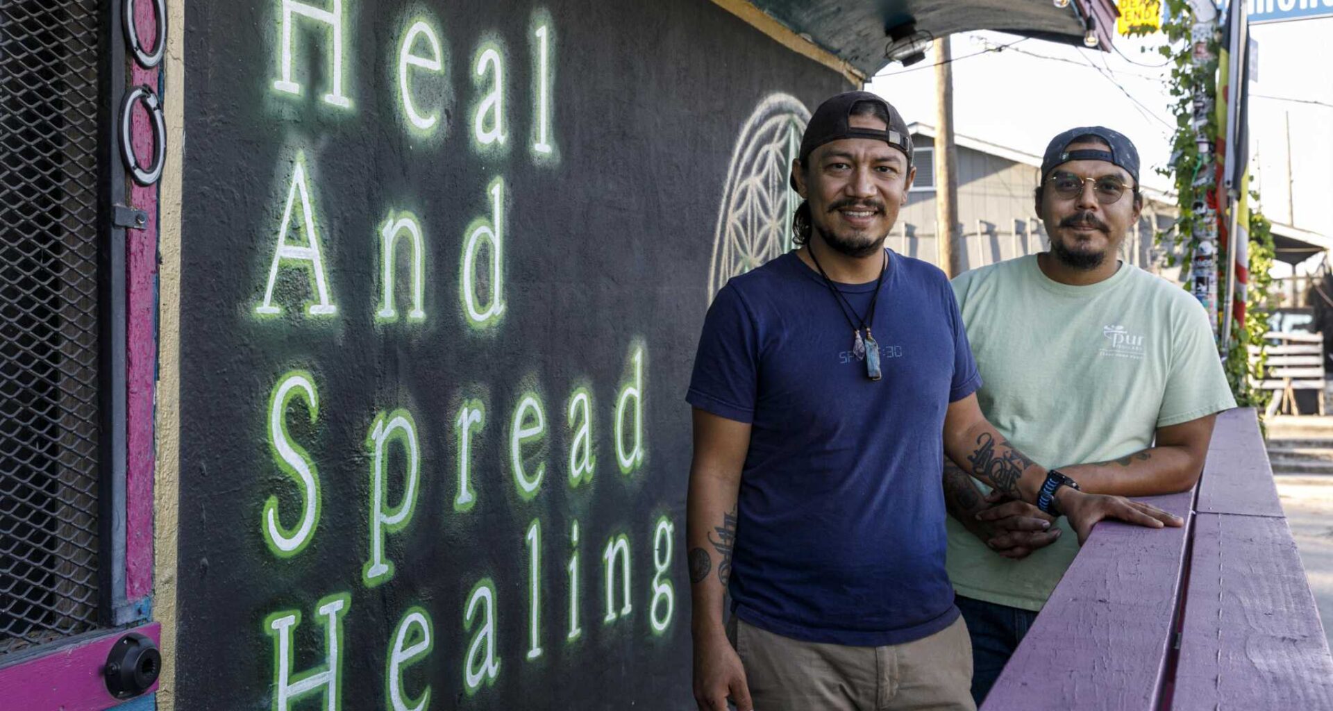 Rogelio, left, and Michael Sanchez stand outside of their restaurant Hash Vegan Eats.