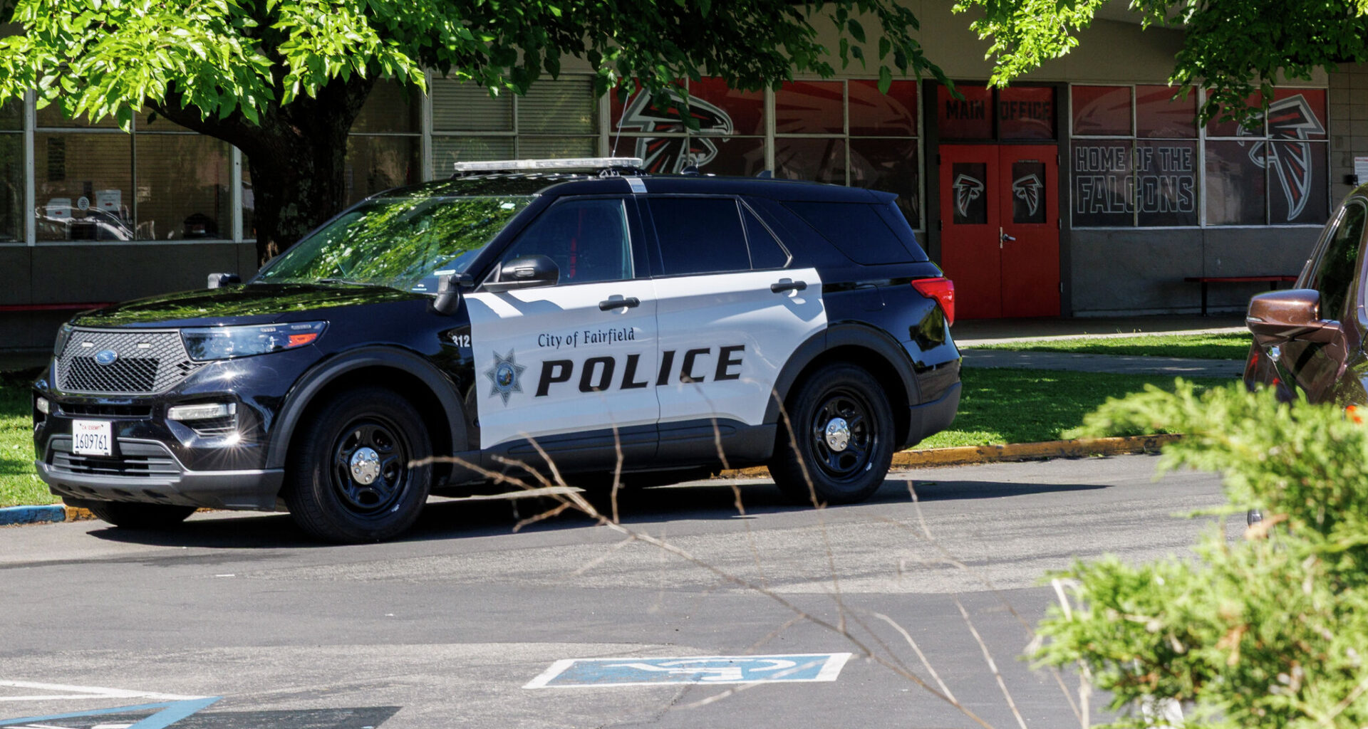 A police vehicle at the scene of a shooting at a high school graduation in Fairfield. Police arrested a 17-year-old they in Texas who they said was the suspected shooter. 