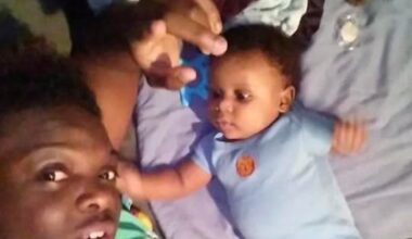 Kealon Gilmore, who was killed in a 2022 outdoor concert shooting in Dallas, with his son. 