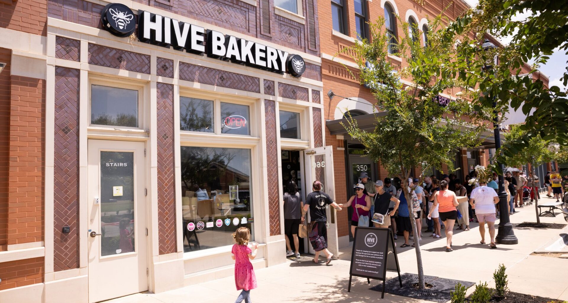 A line of customers waits to enter Hive Bakery in Flower Mound, Texas, Saturday, July 11, 2026.