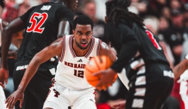 Grant McCasland and Donovan Atwell are interviewed by CBS after a win at Iowa State.