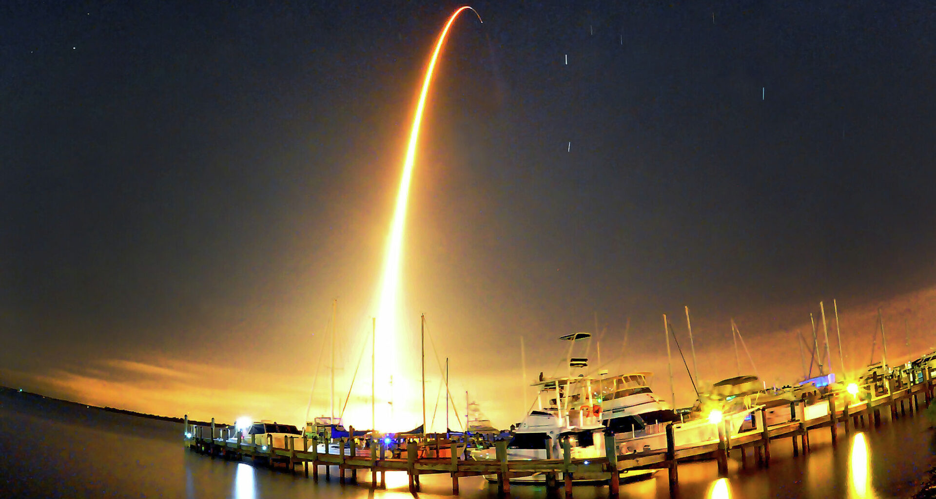 A SpaceX Falcon 9 rocket lights up the sky during liftoff. Elon Musk's company's $250 billion deal for xAI in February juiced the value numbers for 2026.