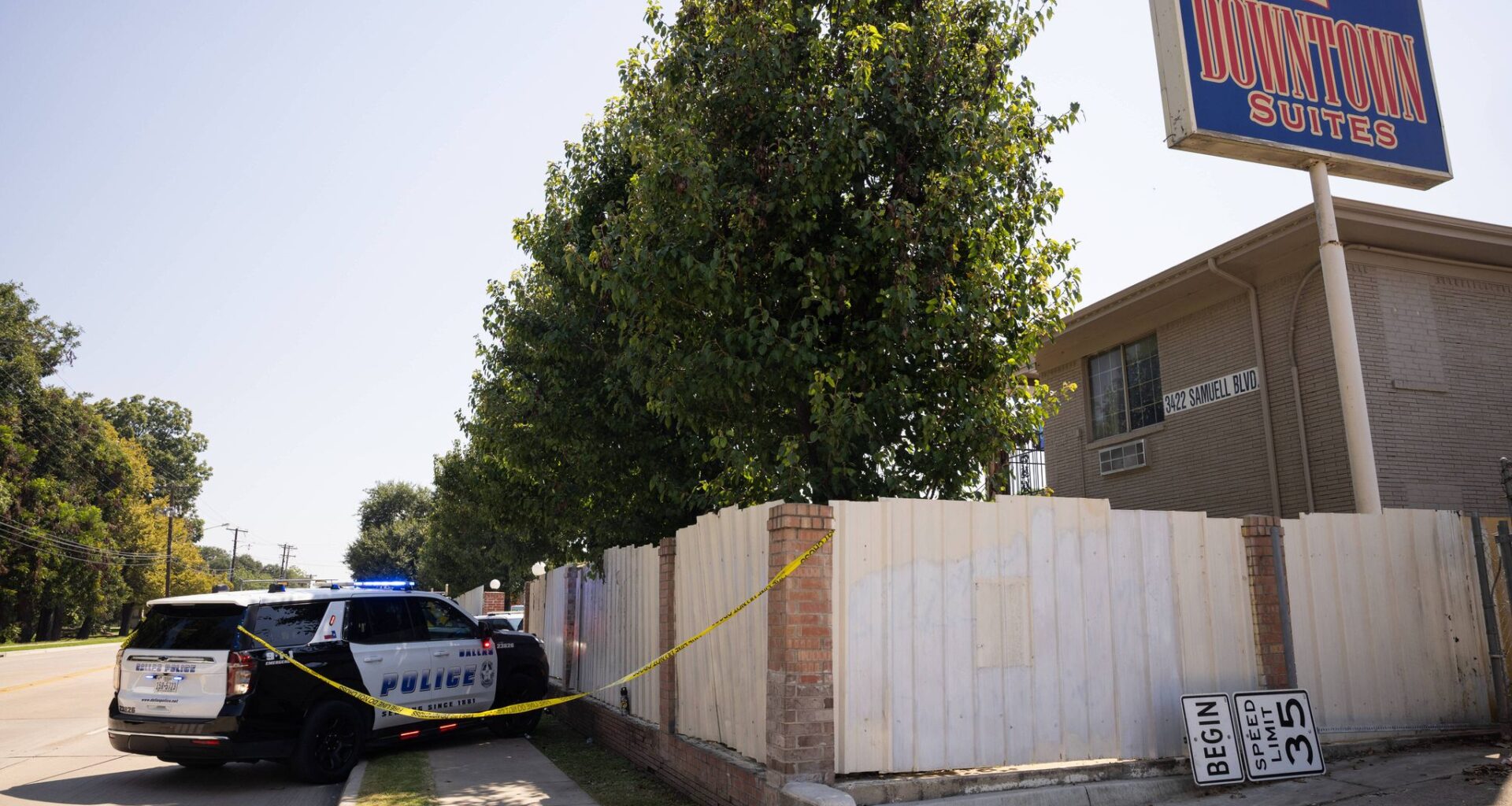 Dallas police work the scene as they respond to a report of a stabbing at the Downtown Suites motel in the 3400 block of Samuell Boulevard in Dallas on Wednesday, Sept. 10, 2025.