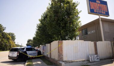 Dallas police work the scene as they respond to a report of a stabbing at the Downtown Suites motel in the 3400 block of Samuell Boulevard in Dallas on Wednesday, Sept. 10, 2025.