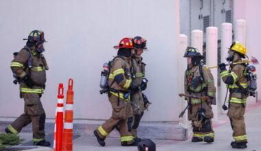 Fort Worth Fire Department firefighters exit H-E-B Alliance as they respond to a fire at the grocery store, Thursday, July 9, 2026, in Fort Worth.