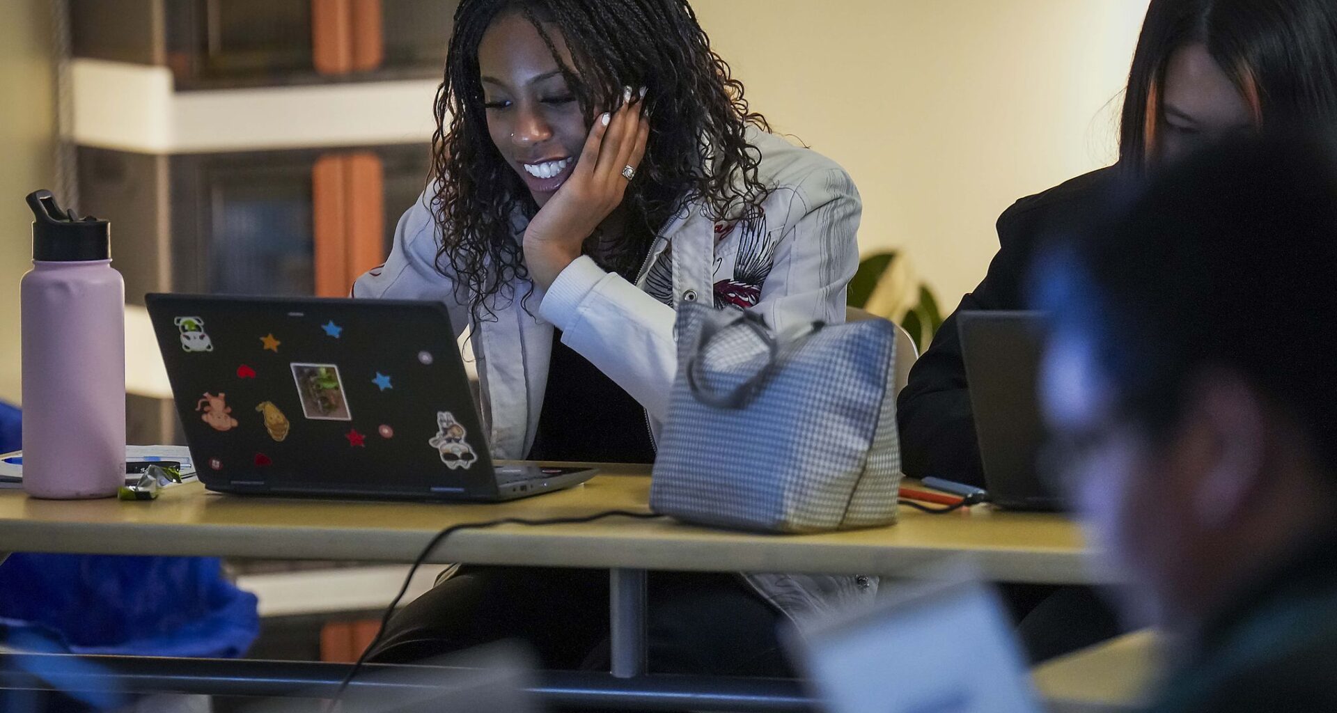 Ariah Barnes works on a laptop during an AP African American Studies class at Kathlyn Joy Gilliam Collegiate Academy on Dec. 15, 2023, in Dallas.