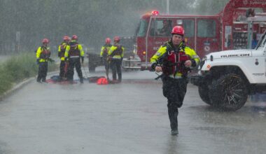 Texas flooding surges from huge rainstorms as rescuers pull people from rising waters