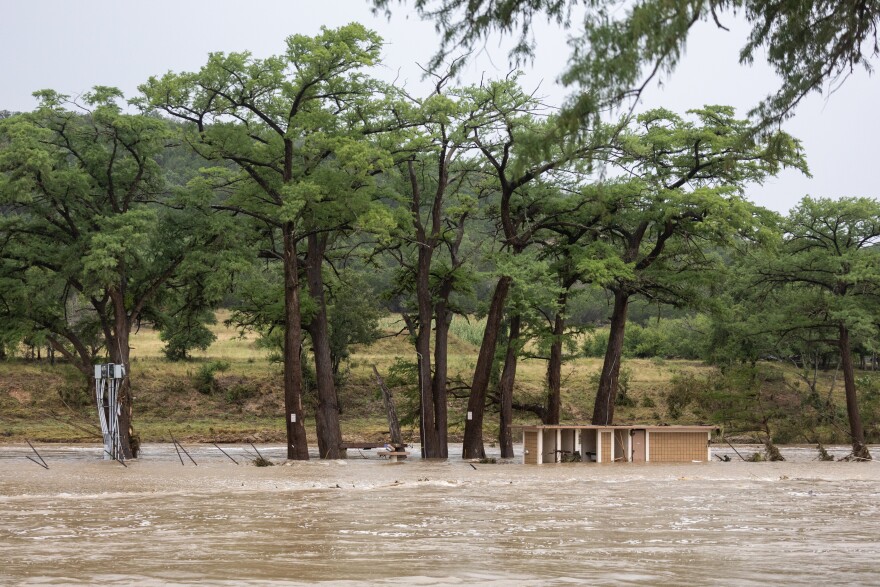 Floodwaters flow through what used to be the Blue Oak RV Park in Kerrville on Thursday, July 16, 2026.
