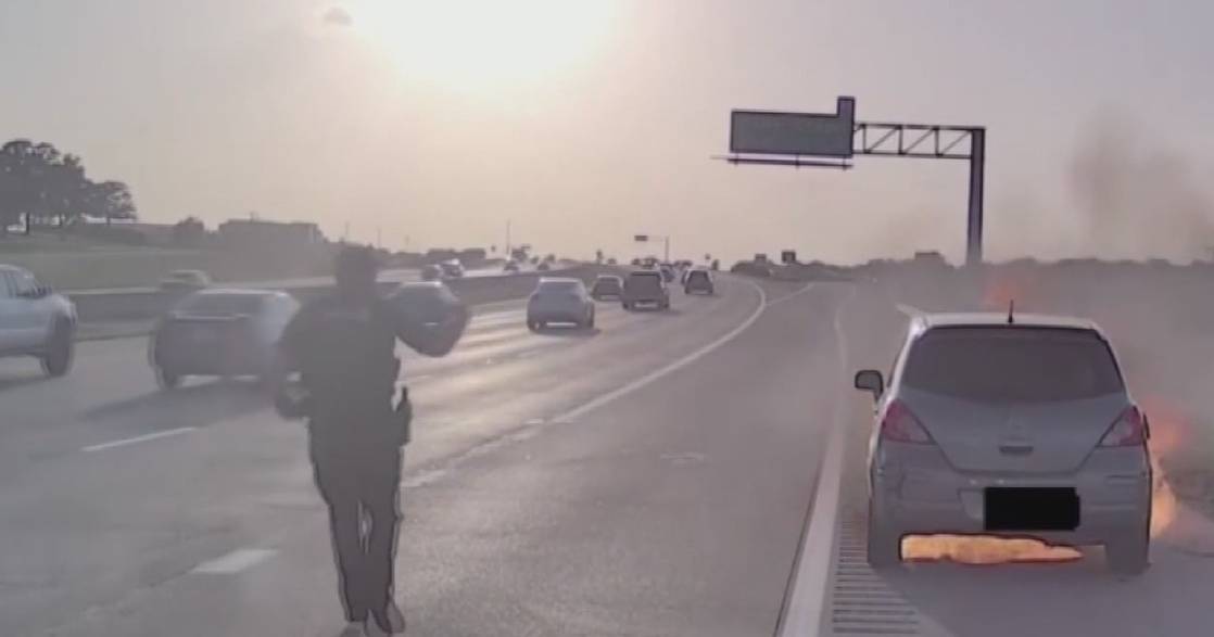 Southlake police officer halts traffic stop, sprints toward burning car on Highway 114