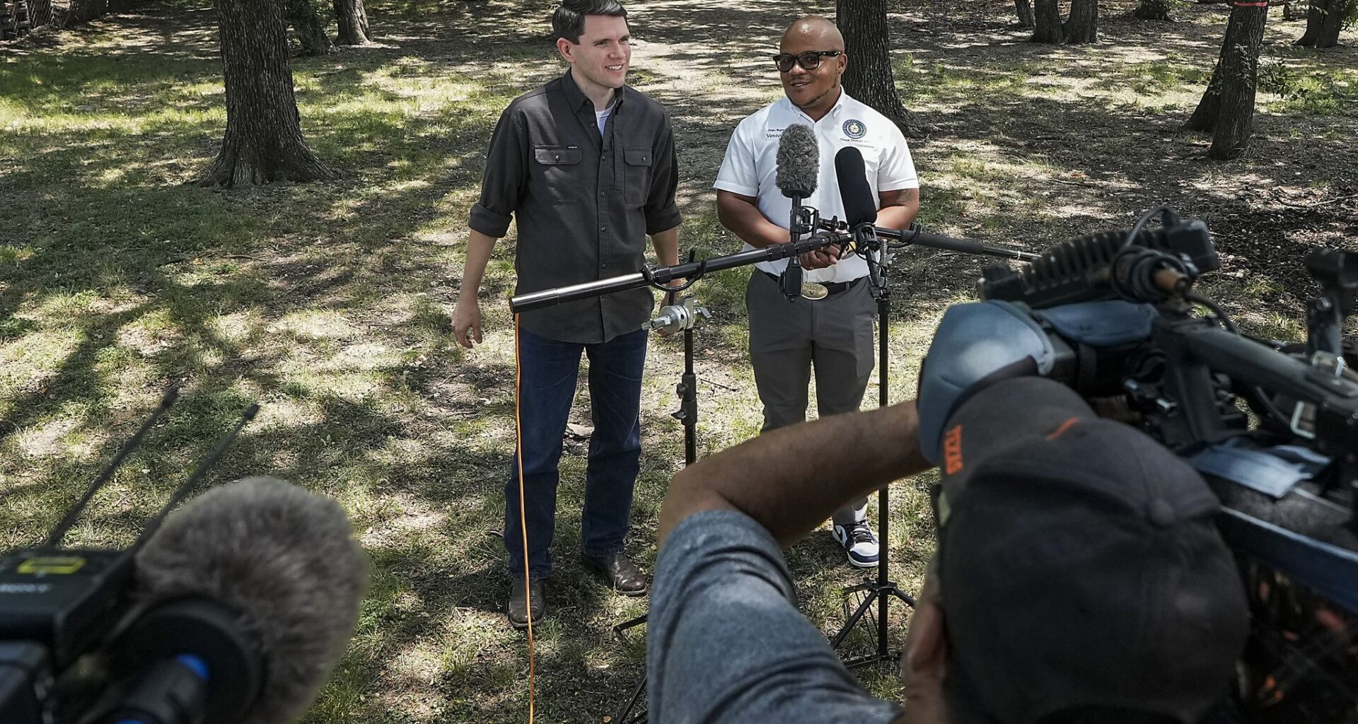 State Rep. James Talarico, the Democratic nominee for Senate (left), addresses reporters July 6 with state Rep. Venton Jones after they visited a West Dallas food pantry.