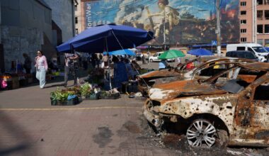 In one of Kyiv's most frequently bombed neighborhoods, residents choose to stay