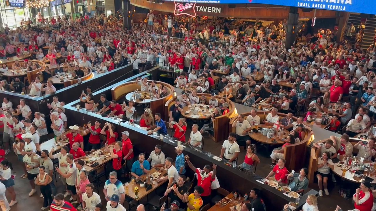 World Cup fans watch a match from Texas Live.