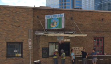 Turf N' Surf seafood window outside Lavaca Street Bar in downtown Austin.