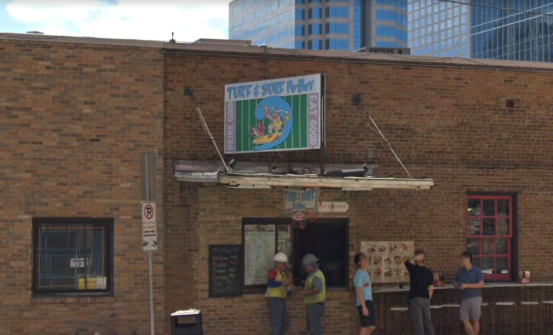 Turf N' Surf seafood window outside Lavaca Street Bar in downtown Austin.