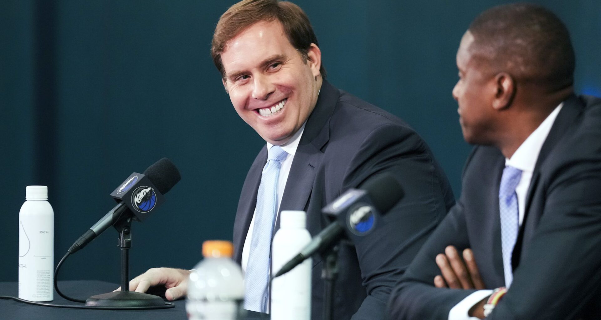Dallas Mavericks forward Cooper Flagg poses for photos with his parents Kelly (left) and Ralph Flagg during a news conference after Flagg was named the 2025-26 NBA Rookie of the Year, Wednesday, April 29, 2026, in Dallas.
