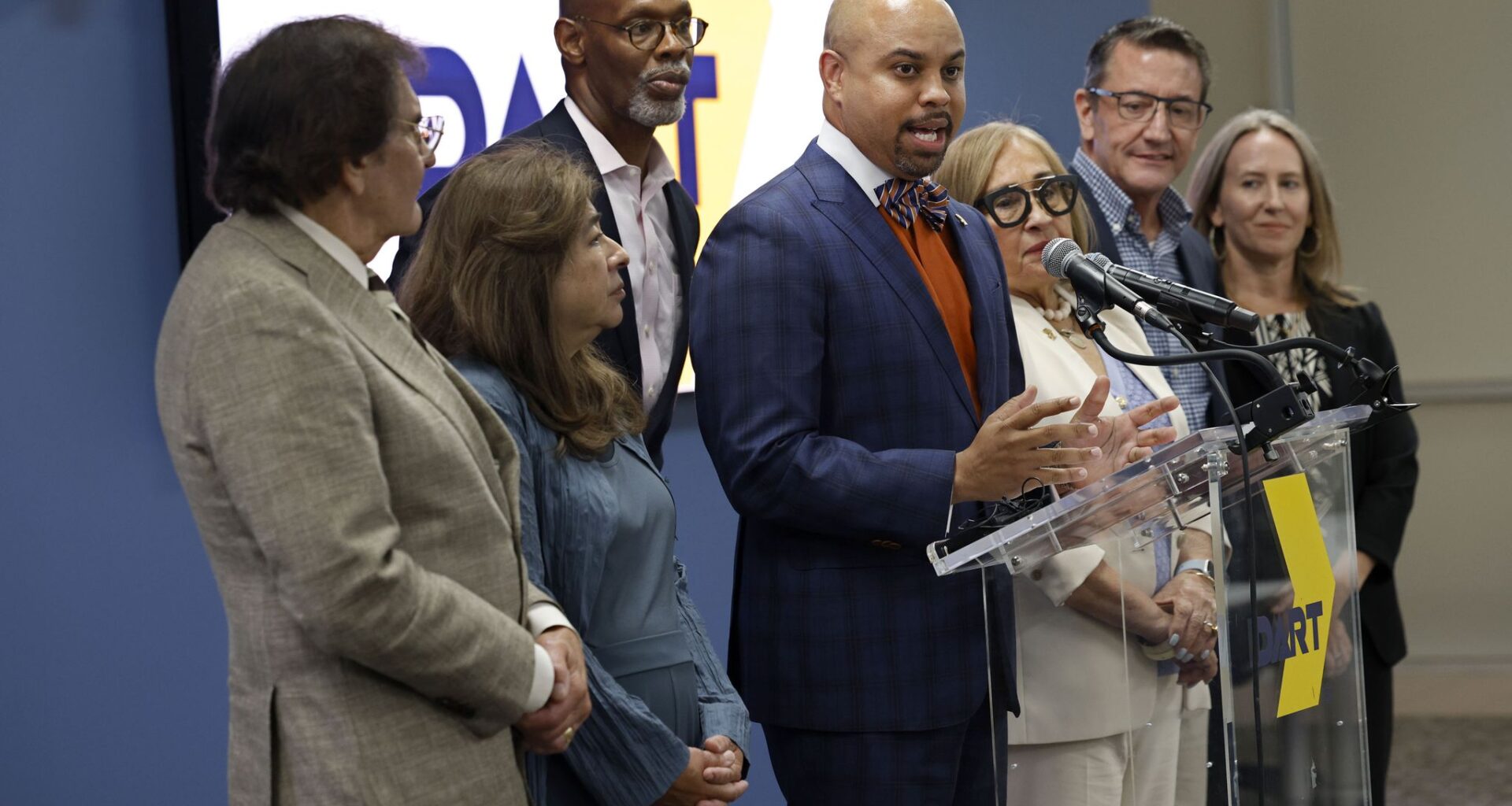 DART Board Chair Randall Bryant announces hiring Nathaniel Ford as their new CEO during a news conference at the DART Headquarters, Tuesday, July 21, 2026, in Dallas, with other board of directors.