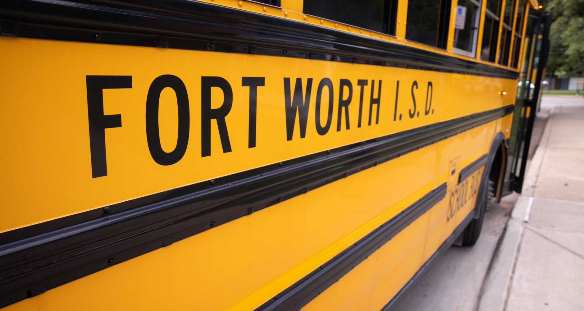 A Fort Worth ISD bus waits for students on the last day of school at International Newcomer Academy in Fort Worth on May 21, 2026. 