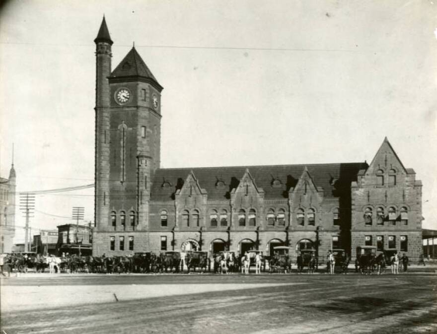 Texas & Pacific Railway Station, located on Main and Front (now Lancaster) Streets, with hansom cabs and delivery wagons lined up in front. (Photo taken in approximately 1900.)