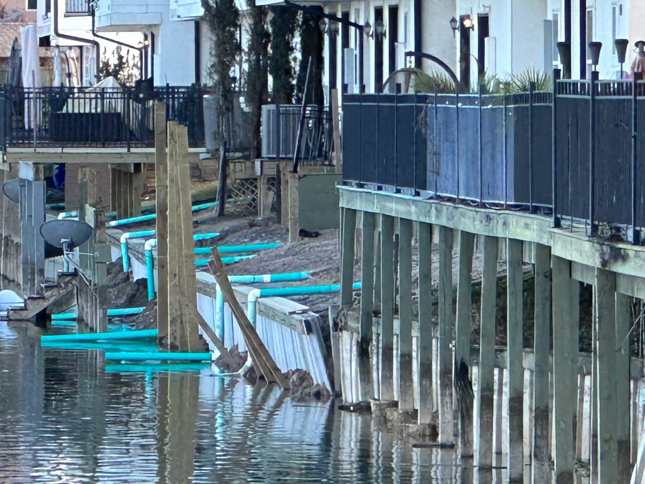 A failing bulkhead traps homeowners in Houston HOA fight