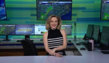 FRIDAY: Some morning spotty rain, then clearing and not *too* hot