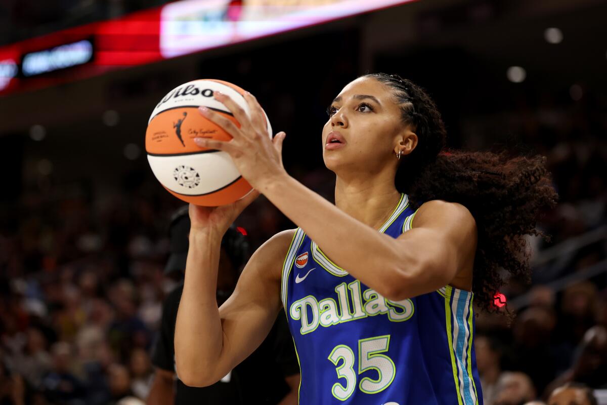 Dallas Wings guard Azzi Fudd competes in the WNBA All-Star three-point shooting contest Friday.